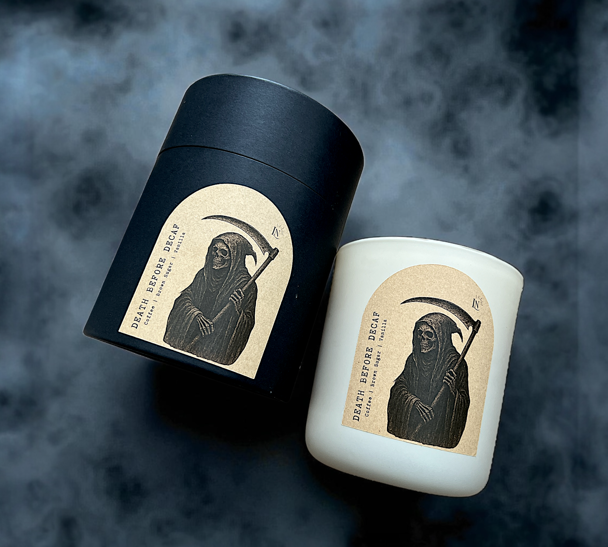 Two candles with grim reaper design labels on a dark background